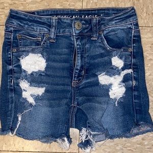 American Eagle Outfitters Hi-Rise Shortie Shorts in Destroyed Blue Wash size 0